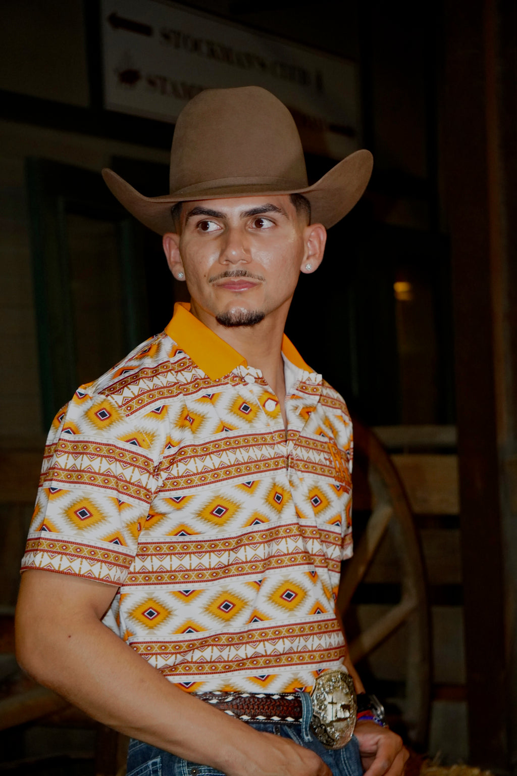 Orange with white Aztec polo