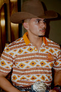 Orange with white Aztec polo